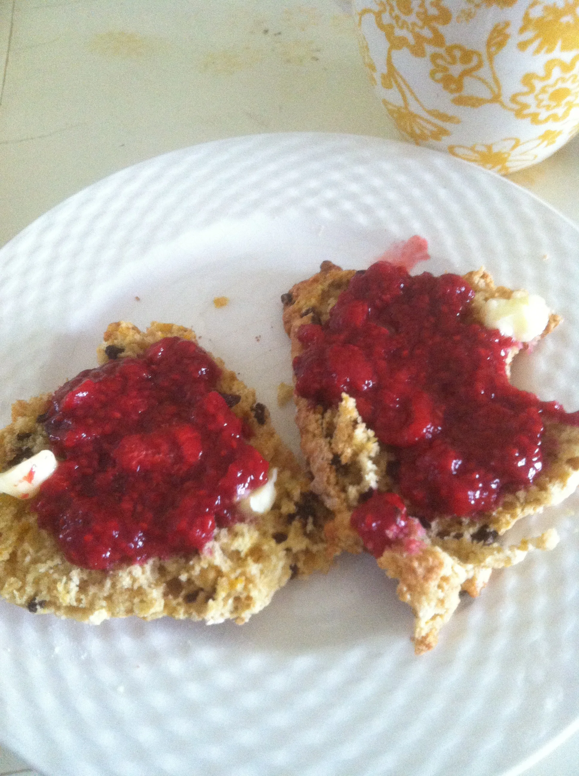Orange-currant scones with warm raspberry jam