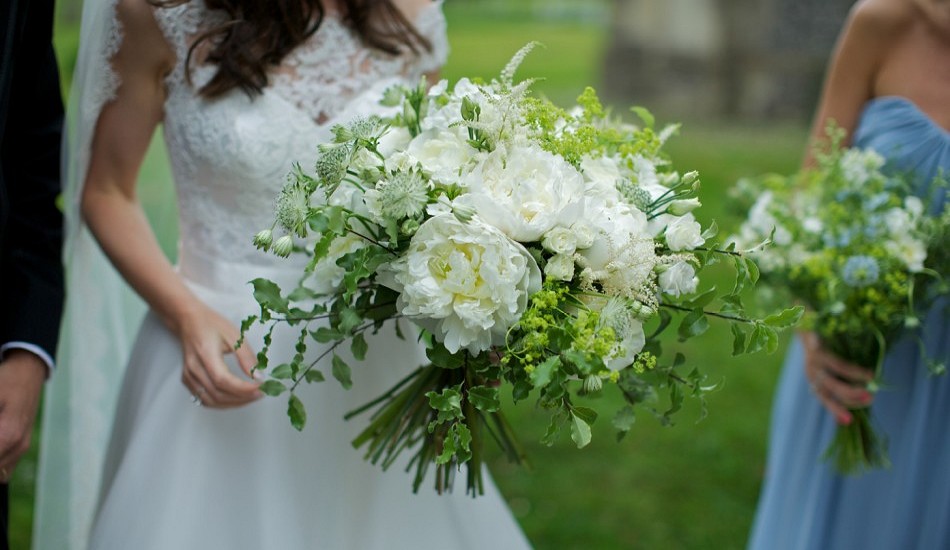 Full blown white Paeonies and heavily scented Norma Jean Roses featured in the Bride’s Bouquet.