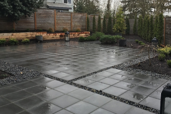  A large patio and simple plantings.   