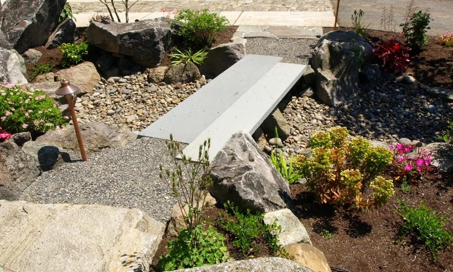  Bluestone slabs over the rain garden. 