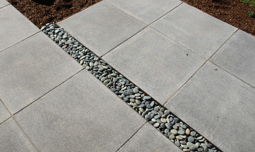  Mexican pebbles in the gaps of the  Architectural Slab paver walkway  