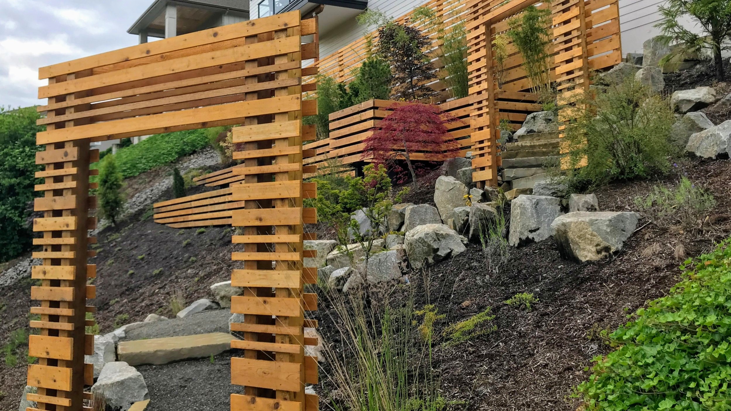  Modern screens , gates, and retaining walls in Camas, WA. 