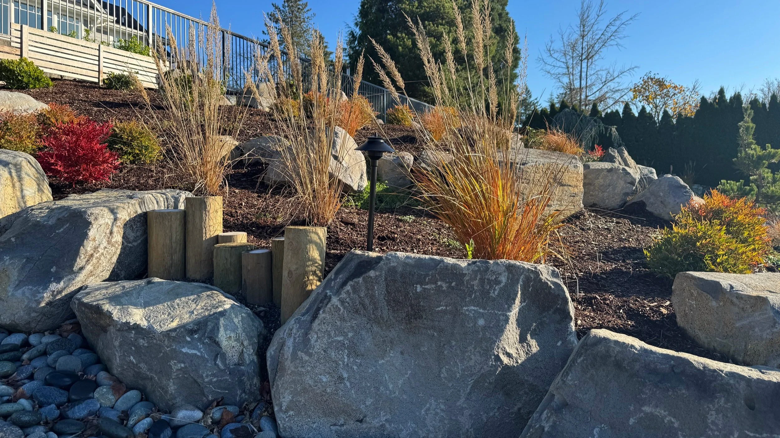 timber boulder wall.JPG