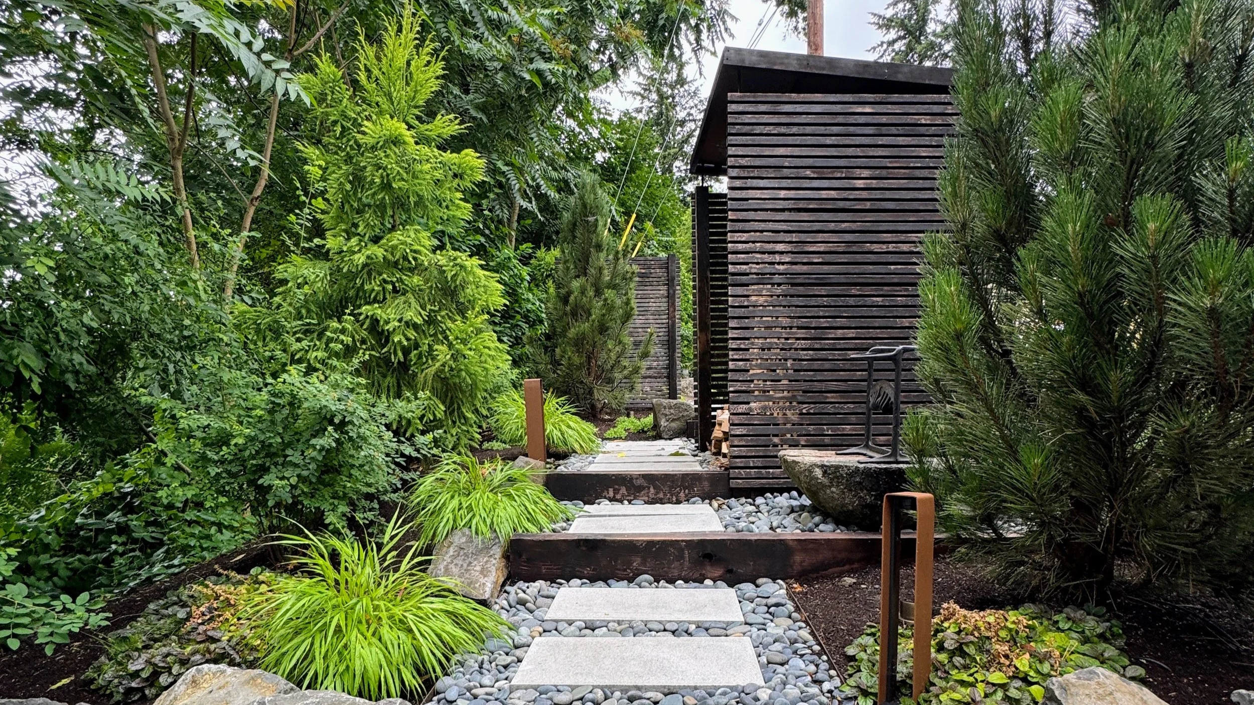Modern path in Japanese inspired garden.JPG