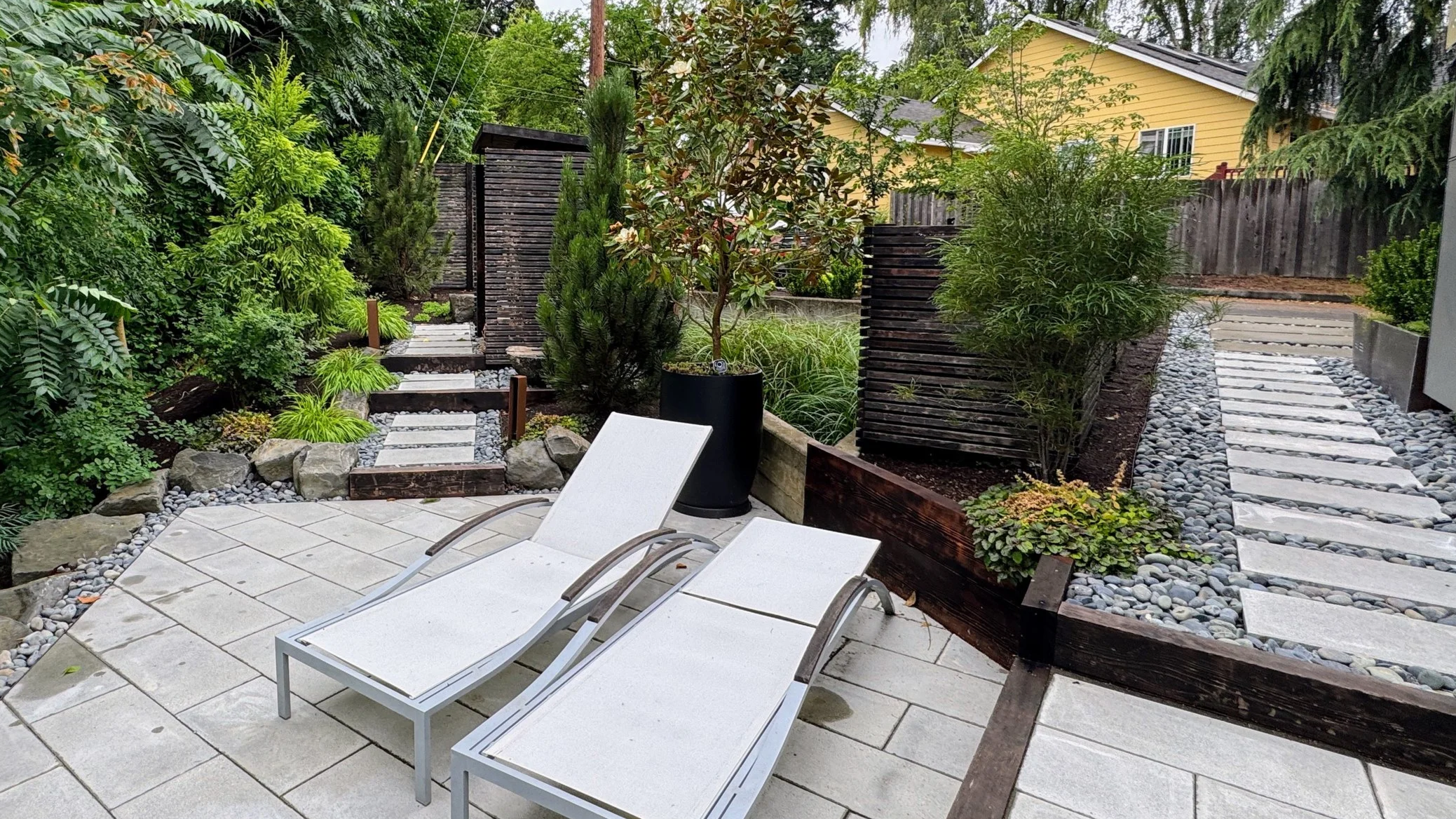 Modern pavers and wood timber steps.JPG