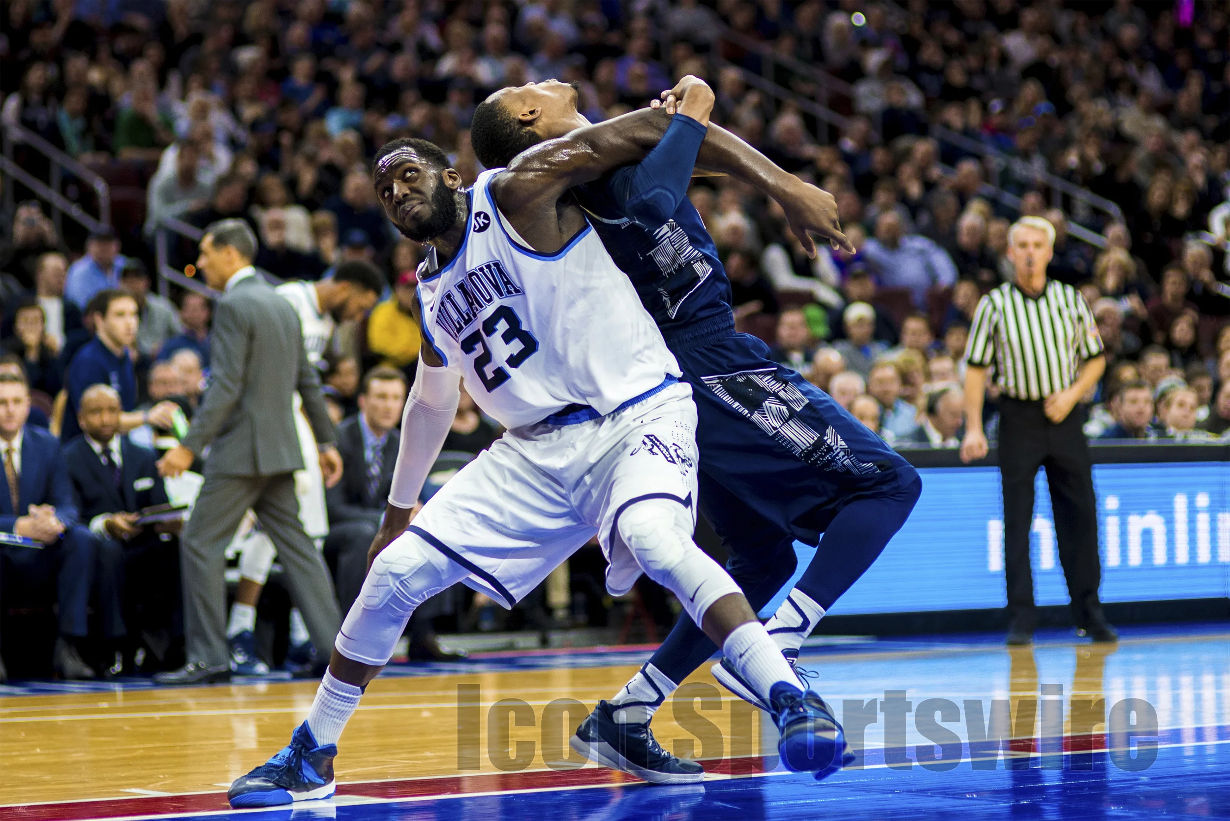 7 Feb 2015: Villanova Wildcats forward Daniel Ochefu (23) holds off Georgetown Hoyas forward Aaron Bowen (23) for the rebound during the NCAA men's basketball game between the Georgetown Hoyas and the Villanova Wildcats played at the Wells Fargo Center in Philadelphia, PA