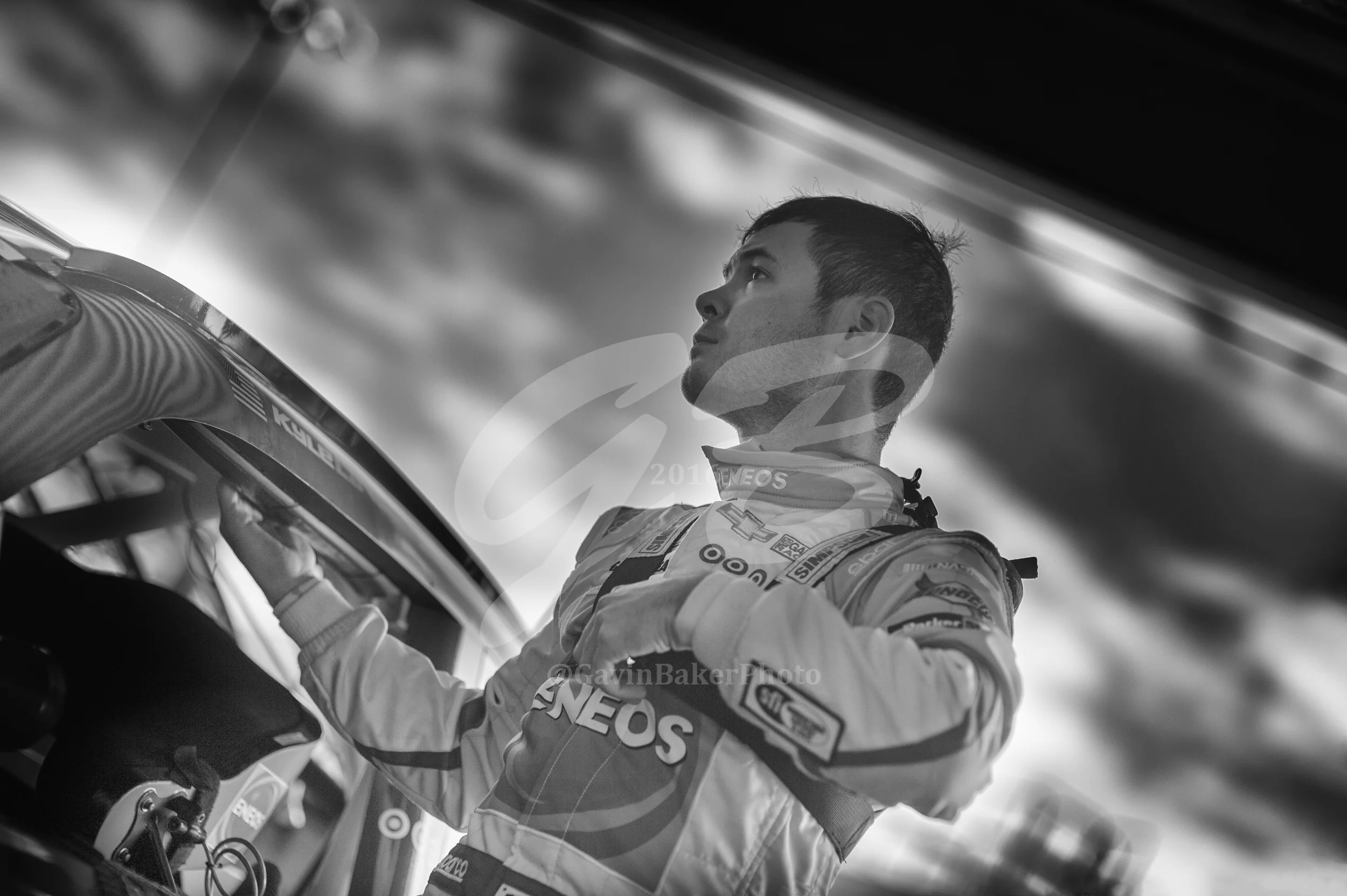 Kyle Larson getting into the #42 Eneos Chevy. Preparing for an Xfinity practice session.
