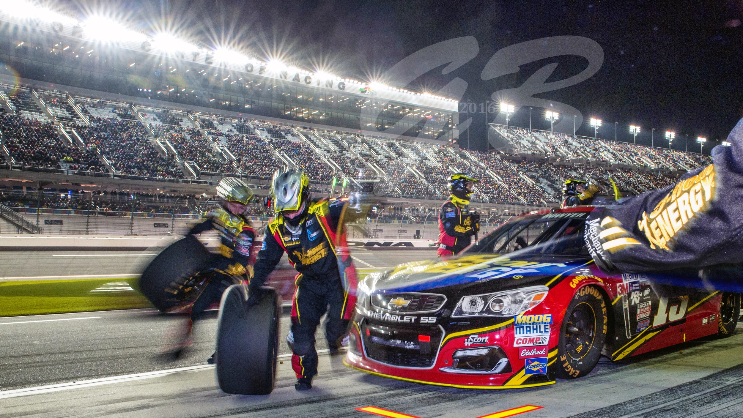 The 5-Hour Energy Chevy of Clint Bowyer gets its tires changed during a pit stop during the Can Am Race