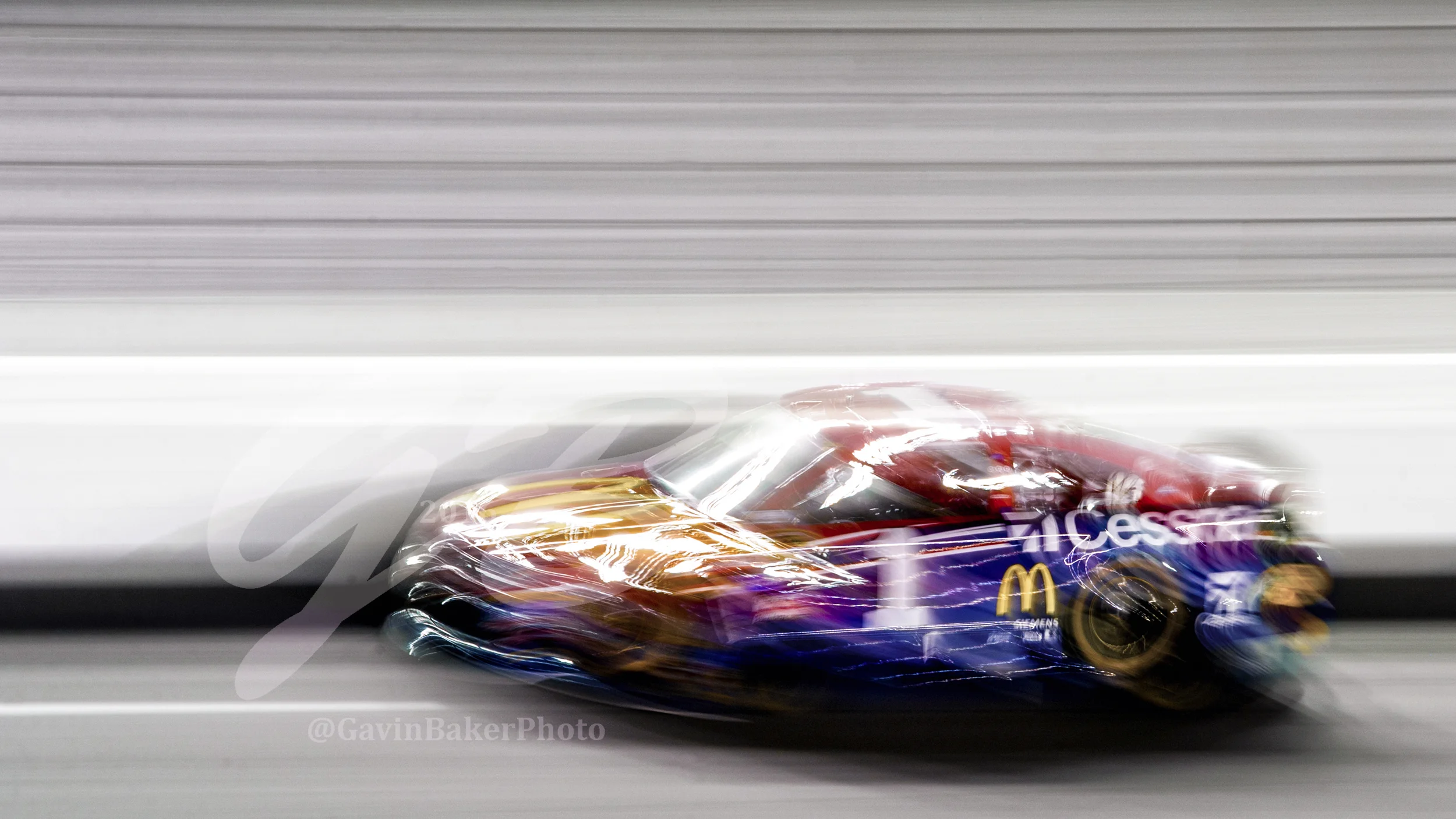 The #1 McDonalds / Cessna Chevy driven by Jamie McMurray speeds down the front stretch during the Can Am Duel