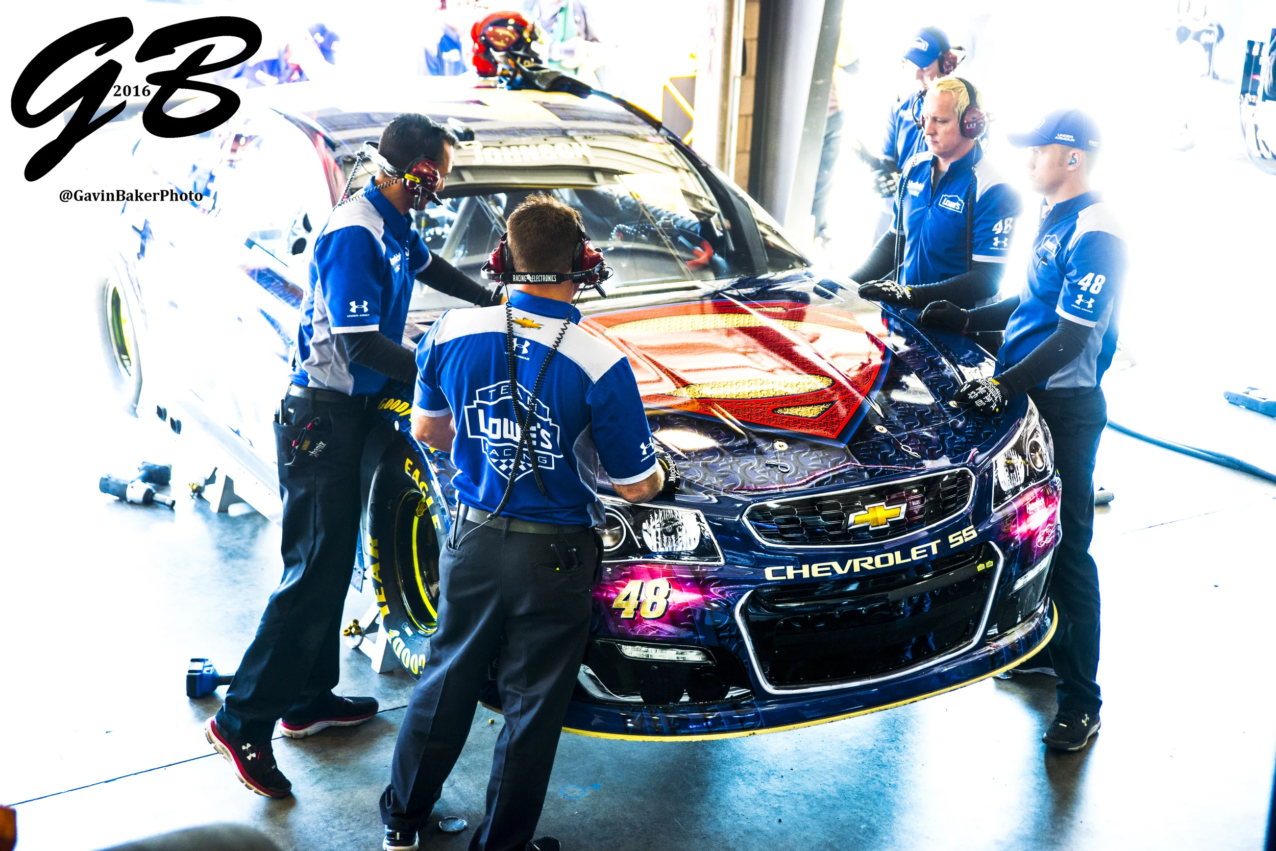 The #48 crew puts dials in the final adjustments on the Lowe's / Superman Chevy before the Auto Club 400 in Fontana Ca.
