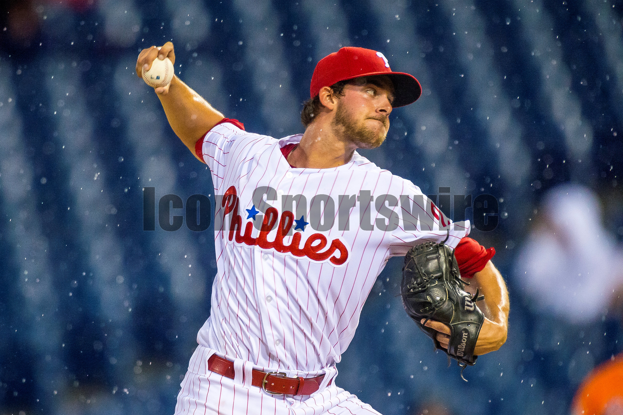  1 April 2016: Philadelphia Phillies starting pitcher Aaron Nola (27) winds up to pitch in the rain during the MLB Spring Training game between the Baltimore Orioles and the Philadelphia Phillies played at Citizens Bank Park in Philadelphia, PA. (Pho