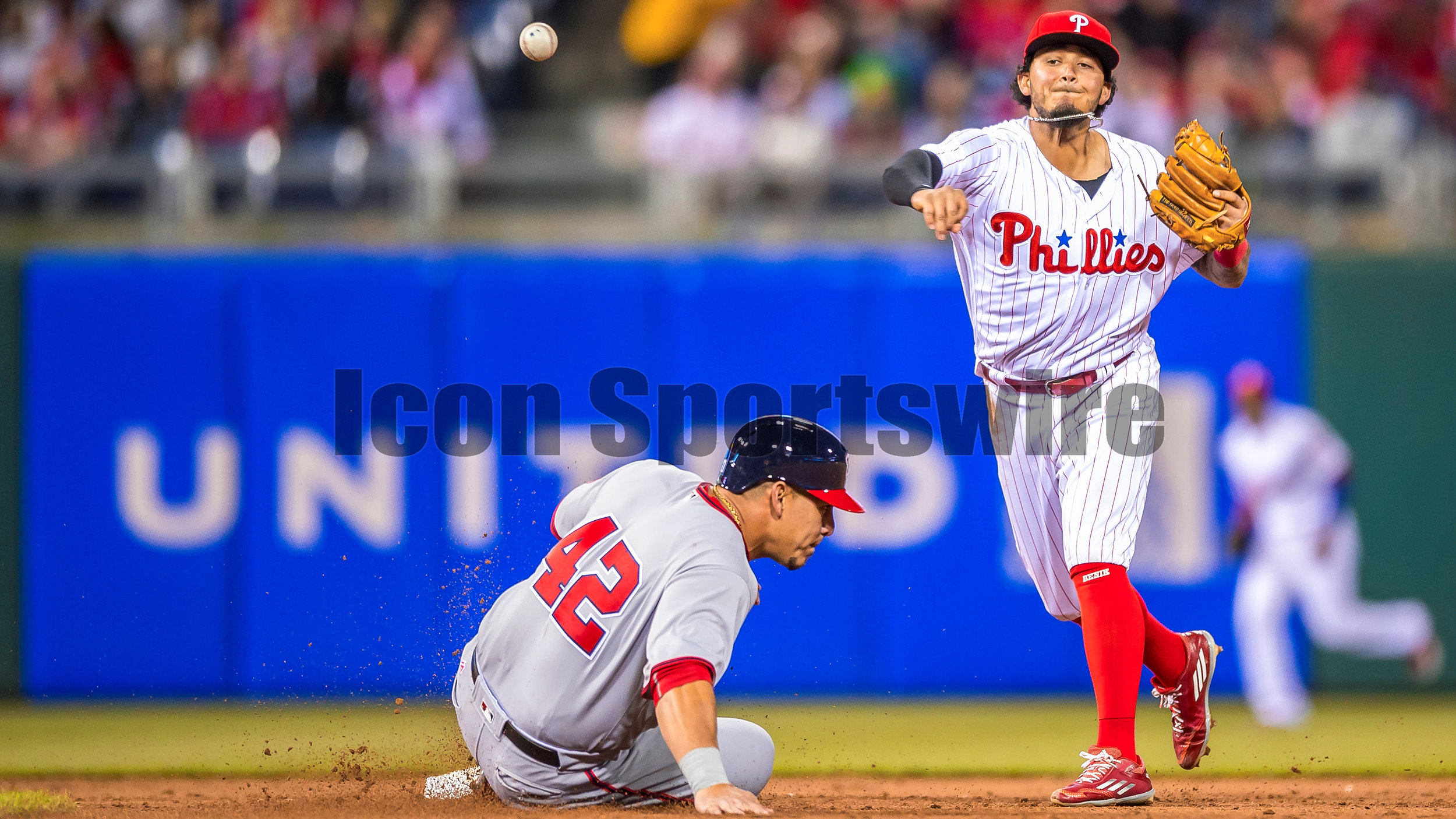  15 April 2016: Philadelphia Phillies shortstop Freddy Galvis makes the tag at second at throws to first attempting the double play during the MLB game between the Philadelphia Phillies and the Washington Nationals played at Citizens Bank Park in Phi