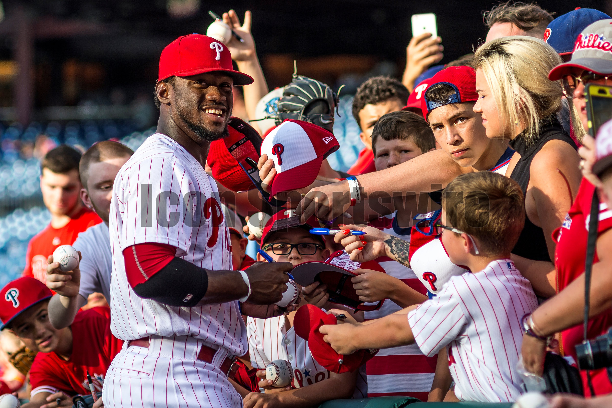  5 July 2016: Philadelphia Phillies center fielder Odubel Herrera (37) signs baseballs for fans before the Major League Baseball game between The Atlanta Braves and the Philadelphia Phillies played at Citizens Bank Park in Philadelphia, PA. (Photo by