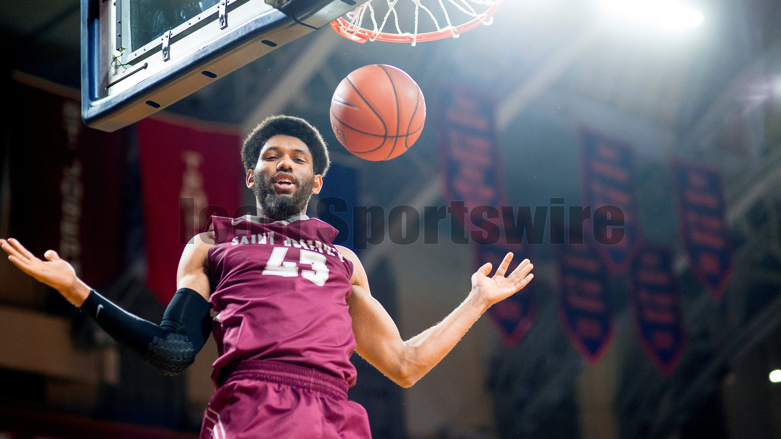  20 January 2016: Saint Joseph's Hawks forward DeAndre Bembry (43) poses after his dunk on the way down from the basket during the NCAA Men's basketball game between the Penn Quakers and the Saint Joseph's Hawks played at the Palestra in Philadelphia