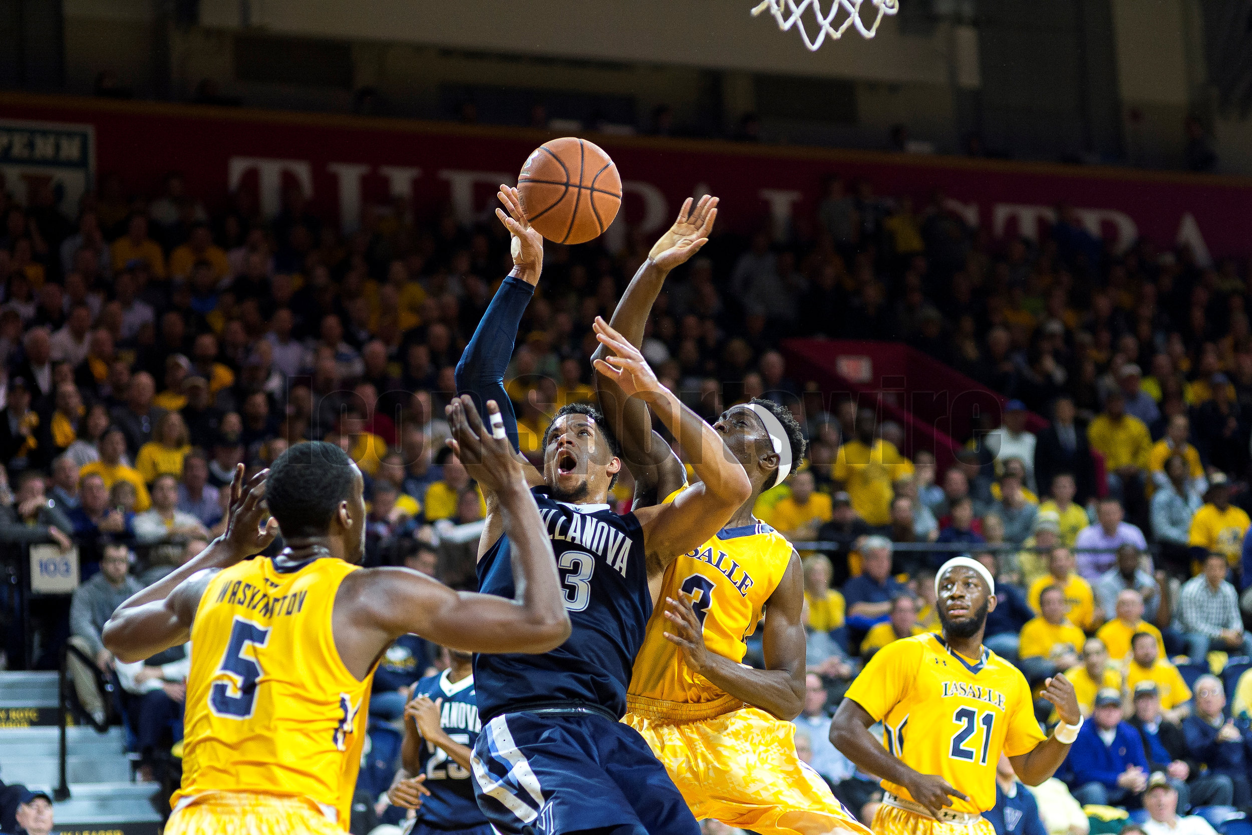  PHILADELPHIA, PA - DECEMBER 06: Villanova Wildcats guard Josh Hart (3) fires his shot crowed beneath the basket during the game between the LaSalle Explorers and the Villanova Wildcats on December 06, 2016 at the Palestra in Philadelphia PA. (Photo 