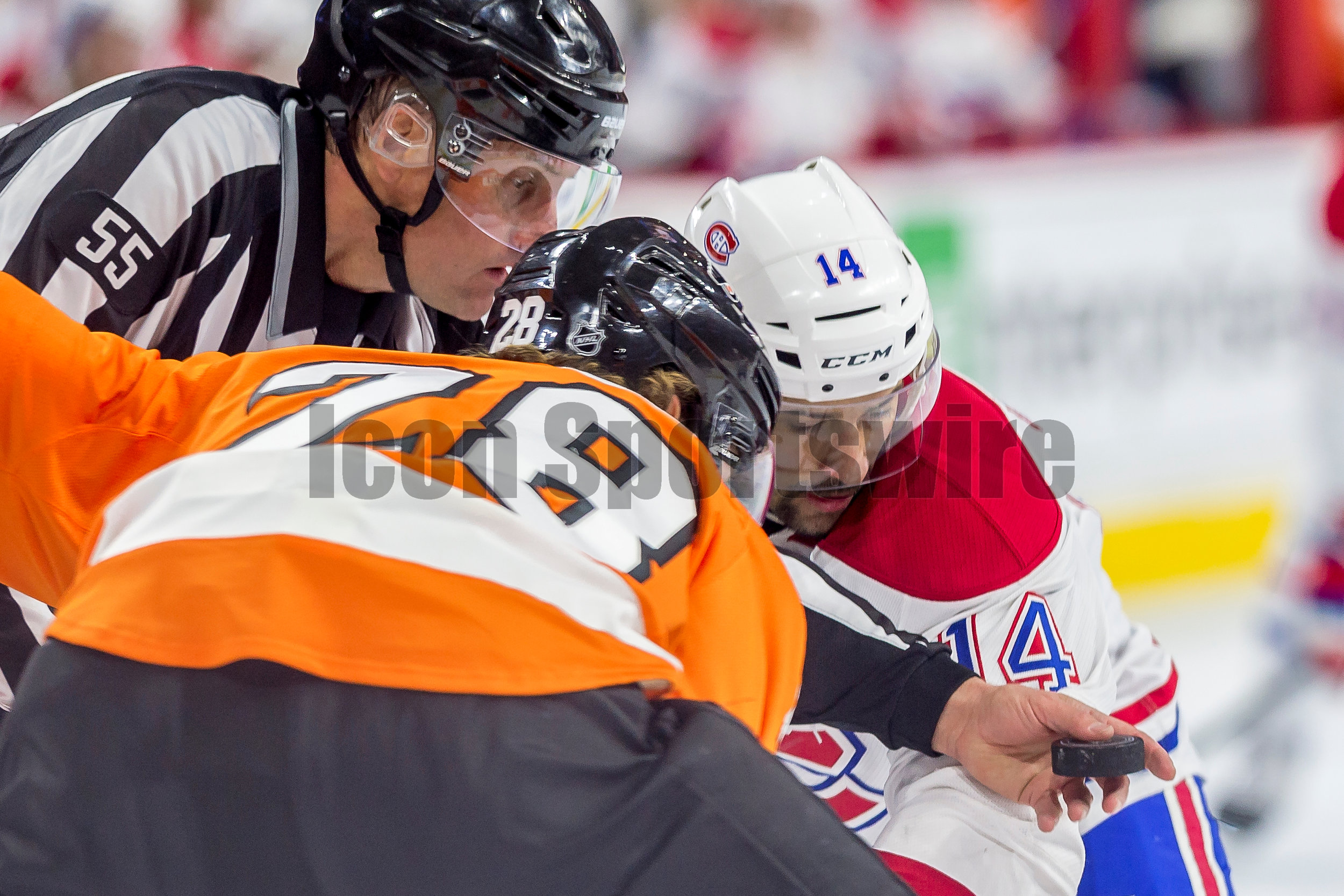  5 January 2016: linesman Shane Heyer (55) ready to drop the puck for Montreal Canadiens center Tomas Plekanec (14) and Philadelphia Flyers center Claude Giroux (28) during the NHL hockey game between the Montreal Canadiens and the Philadelphia Flyer