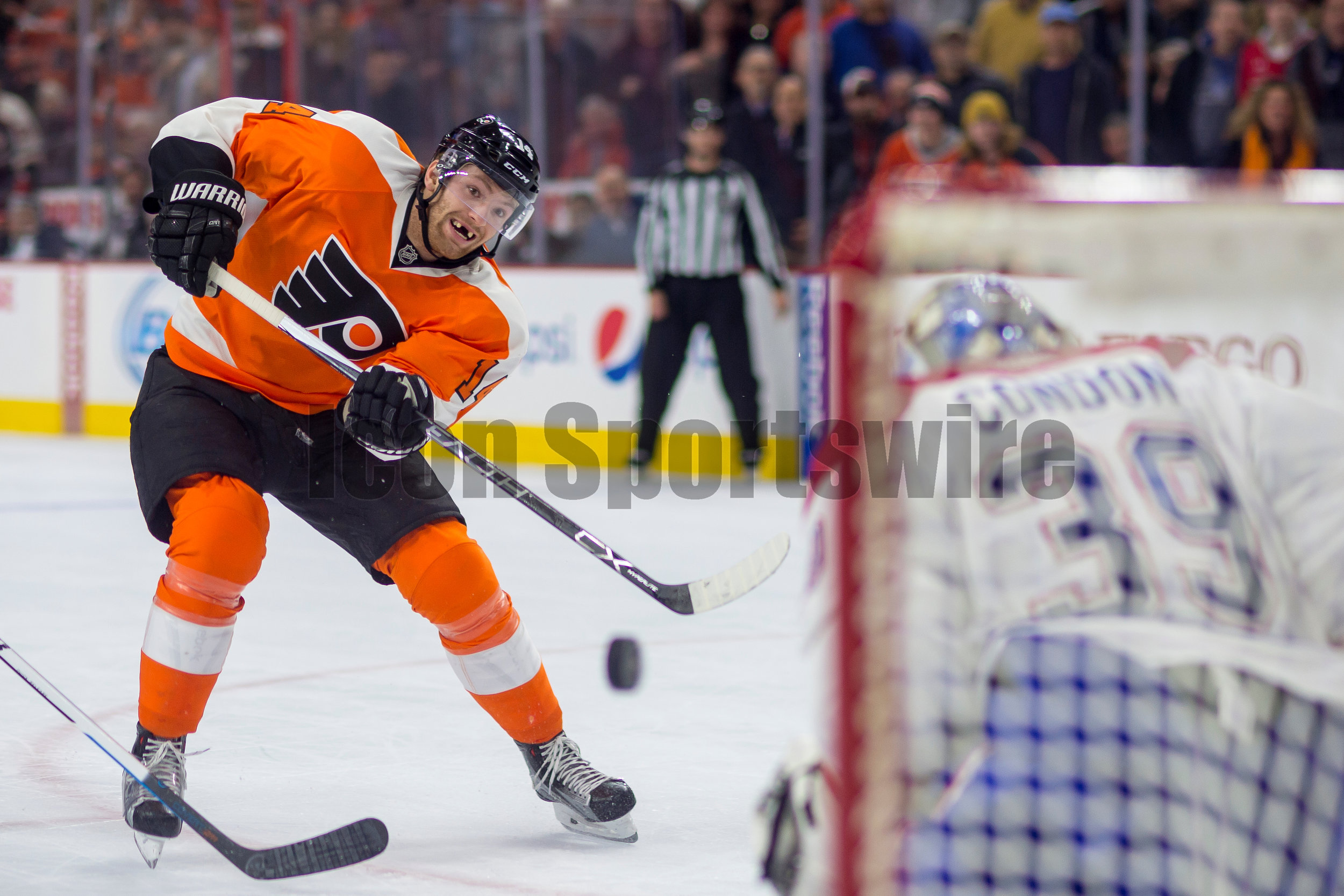  02 February 2016: Philadelphia Flyers center Sean Couturier (14) fires a shot at the goal during the NHL game between the Montreal Canadiens and the Philadelphia Flyers played at the Wells Fargo Center in Philadelphia, PA. (Photo by Gavin Baker/Icon