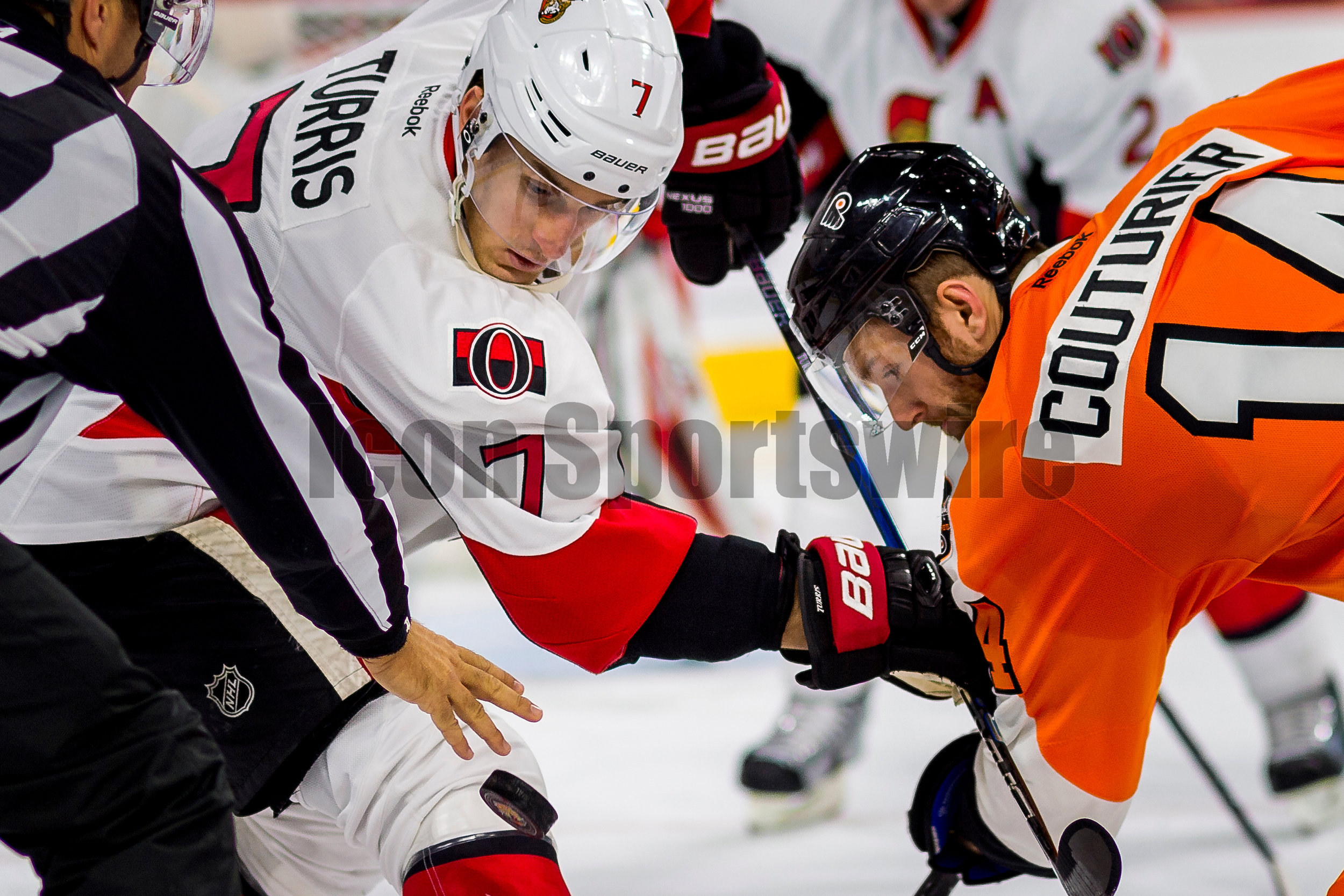  PHILADELPHIA, PA - NOVEMBER 15: &nbsp;Ottawa Senators center Kyle Turris (7) and Philadelphia Flyers center Sean Couturier (14) watch the puck fall from the referee's hand during the game between the Philadelphia Flyers and the Ottawa Senators on No
