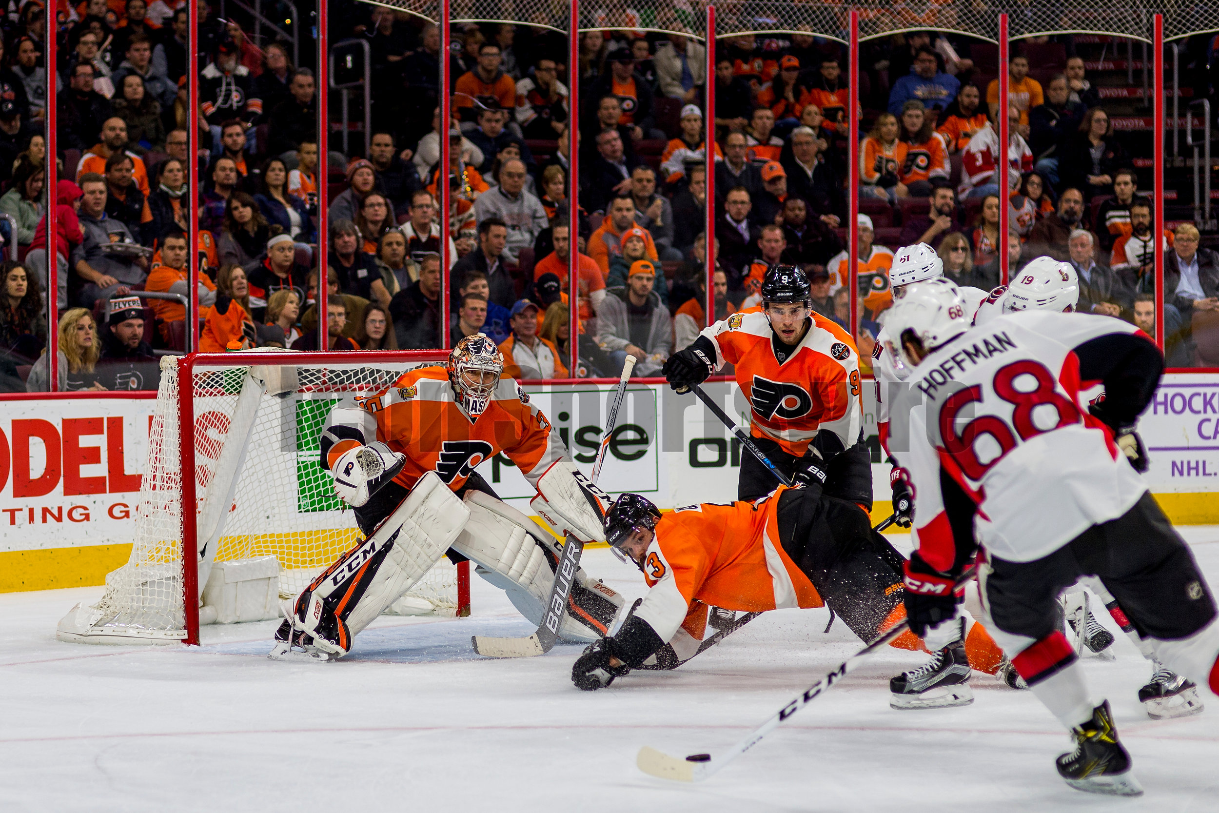  PHILADELPHIA, PA - NOVEMBER 15: &nbsp;Philadelphia Flyers defenseman Radko Gudas (3) dives in front of Ottawa Senators left wing Mike Hoffman (68) while Philadelphia Flyers goalie Steve Mason (35) defends the net during the game between the Philadel