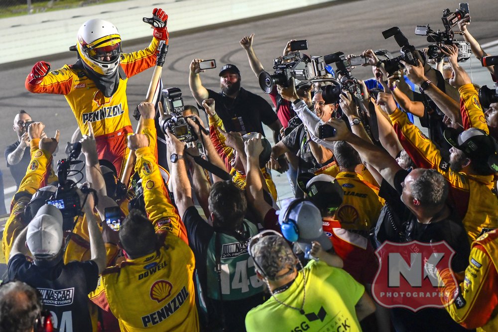 Joey Logano, driver of the #22 Shell Pennzoil Ford Fusion for Team Penske wins the Ford EcoBoost 400 and the Monster Energy NASCAR Cup Series championship. 