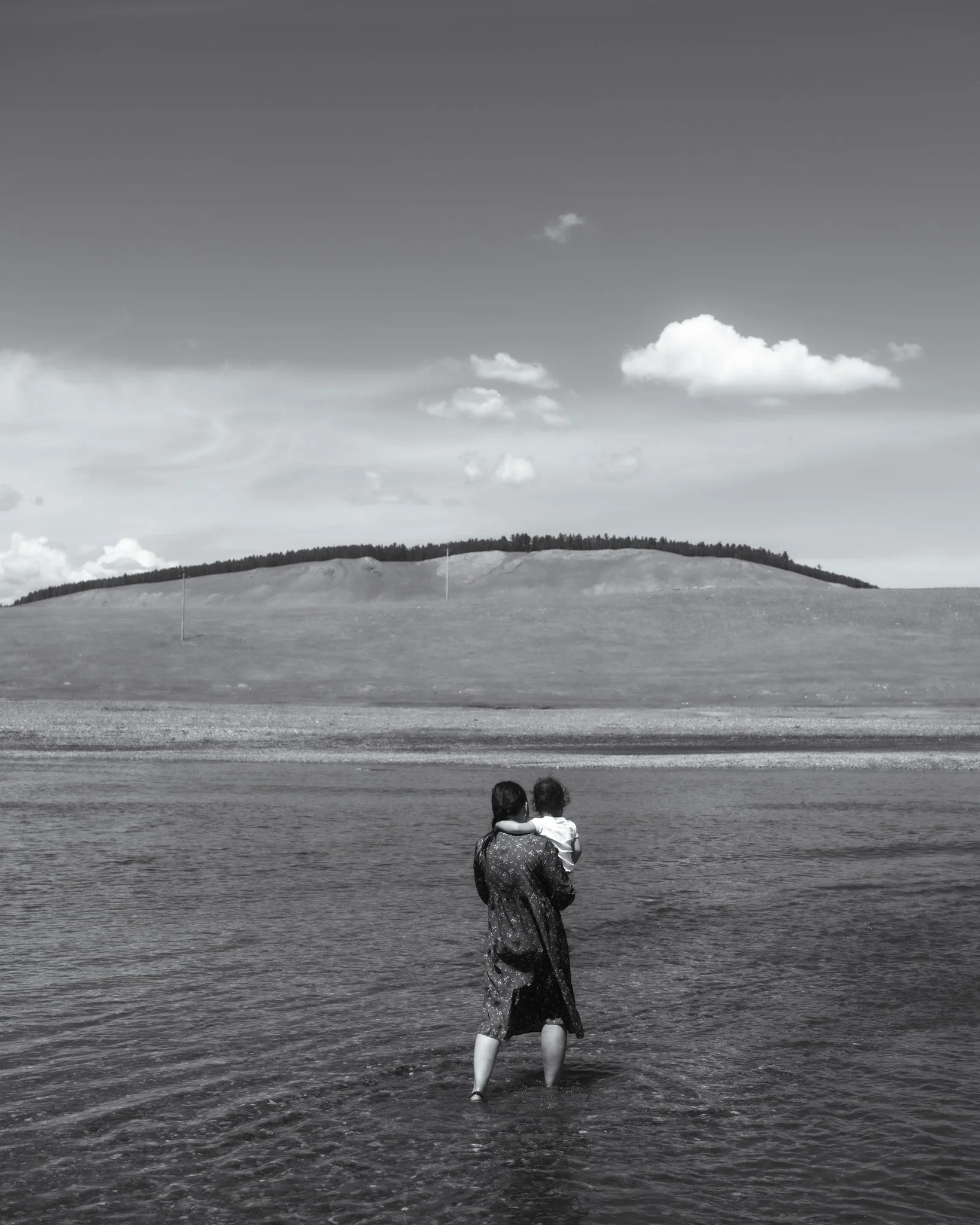 Woman and Child Crossing the River.jpg