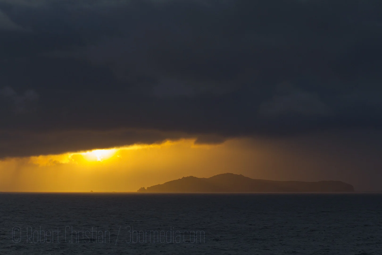 The sun sets behind the Blasket Islands.