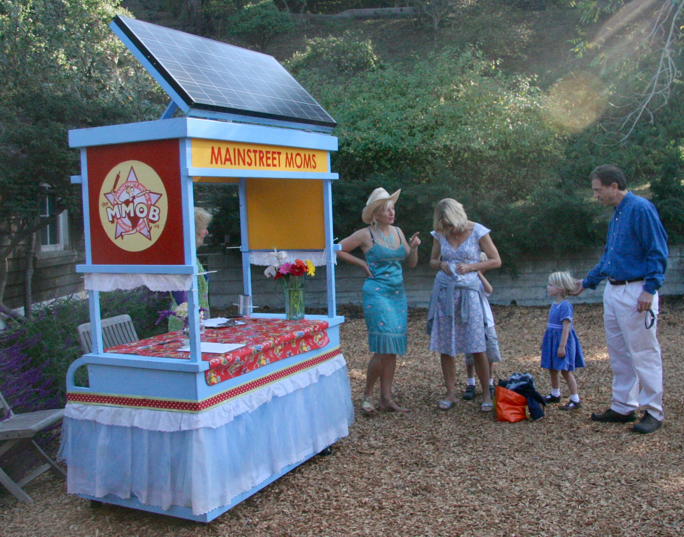 The Solar Powered Tea Trolley, a mobile platform for communications, demonstrating a renewable message.