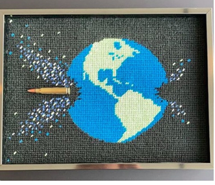 Bullet Through the Planet Earth, $500
 
Stitched area 7.25” x 10.5”