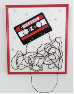 Unravelling Cassette Tape, $500
 
Stitched area 8” x 9”
