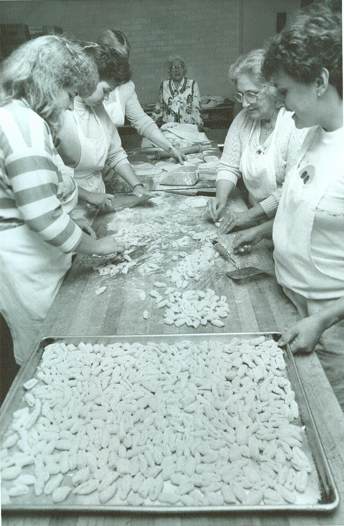 carbone's employees hand rolling gnocchi in 1976.jpg