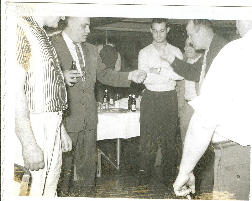 al lamo, mel pezzoli and friends playing morra in carbone's.jpg