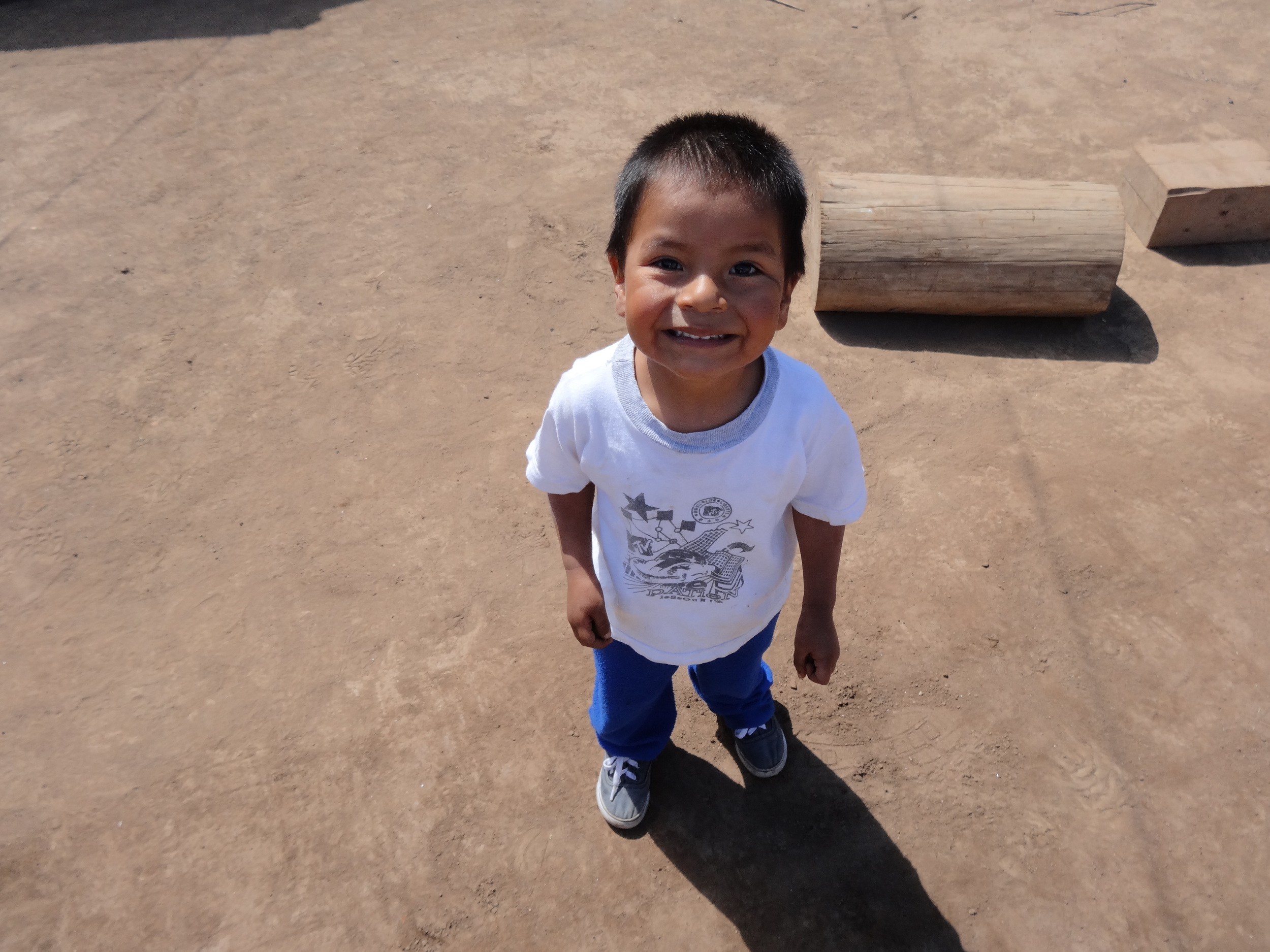 Guatemalan boy at family brickworks.
