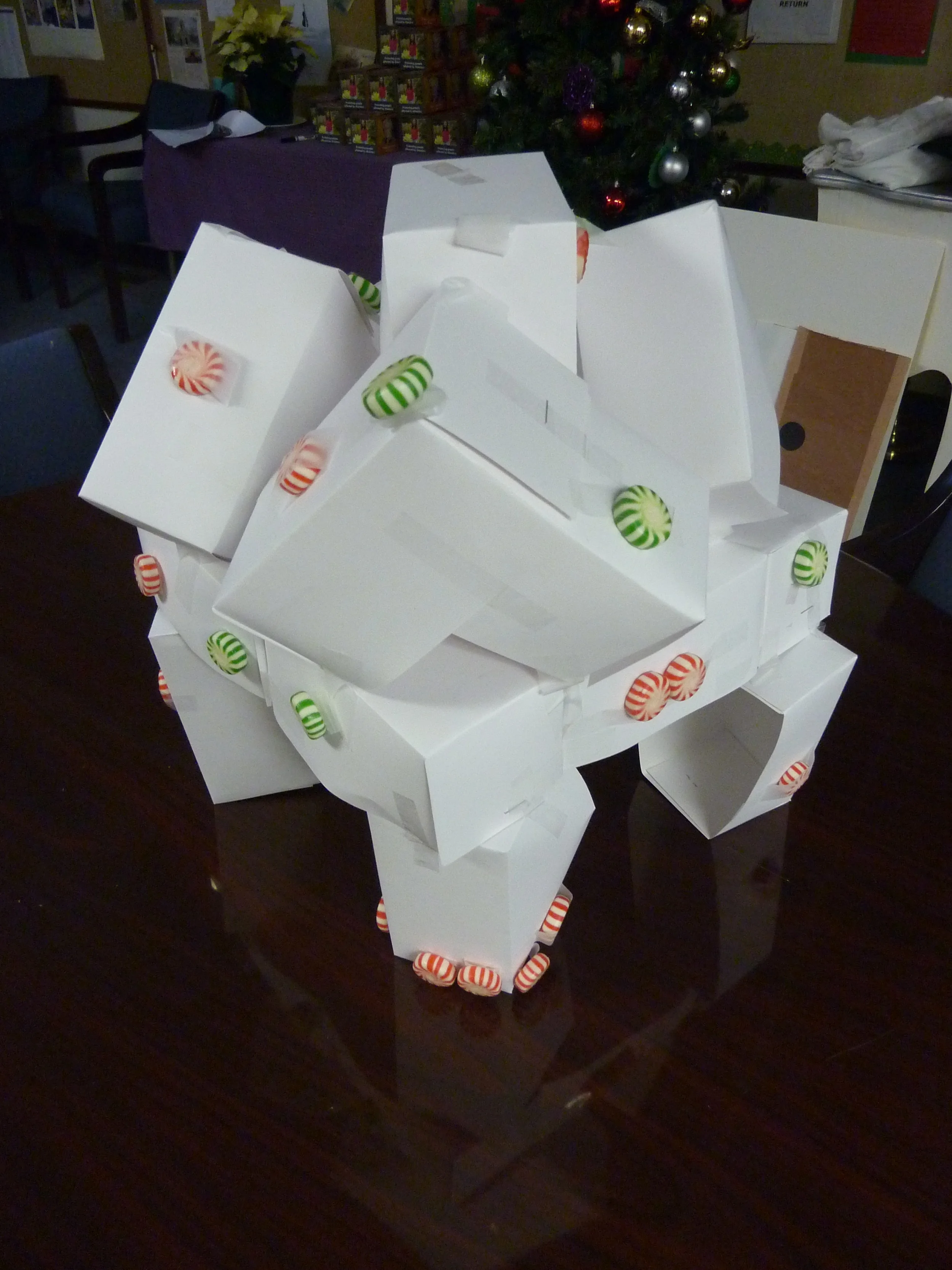 Teams of boys and volunteers from UUSG and Transitional Alternatives became acquainted while creating “gingerbread skyscrapers." Pictured is a "beach house on stilts."