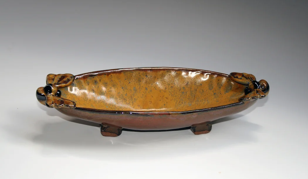 Bee Dish Stoneware, glaze 2” high x 10” long x 4’ wide $50 – SOLD 