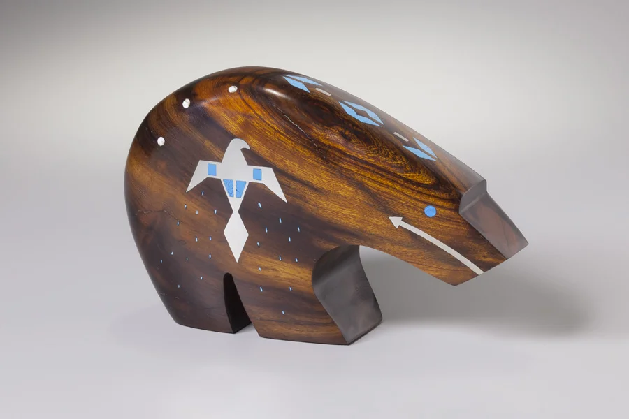 Bear with Phoenix Desert ironwood inlaid with turquoise and sterling silver 7” x 12” x 3” $750