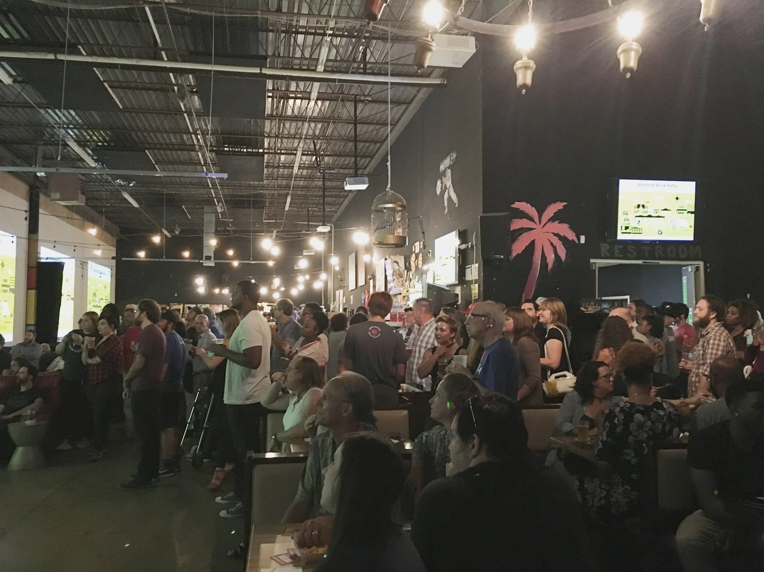 The crowd listens as Indie Memphis Executive Director Ryan Watt previews this year's festival at the Indie Memphis Preview Party, Sept. 26, 2017.