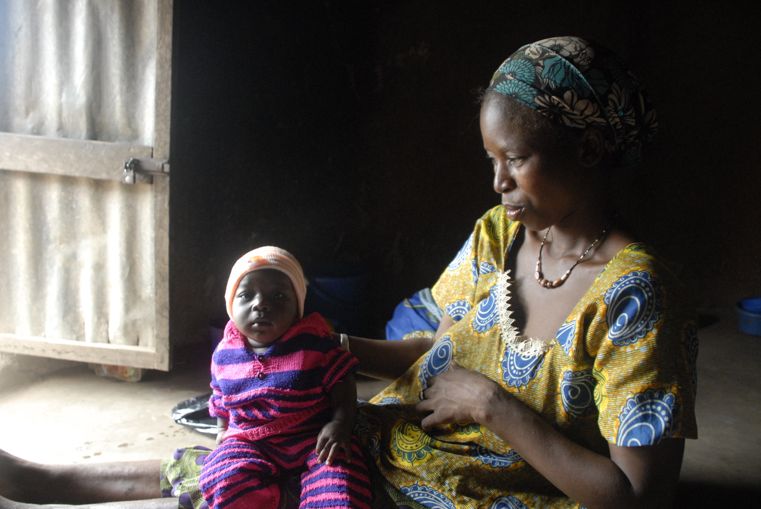  Maimouna shows off her two-month-old son’s new hat in her home in northern Togo. 