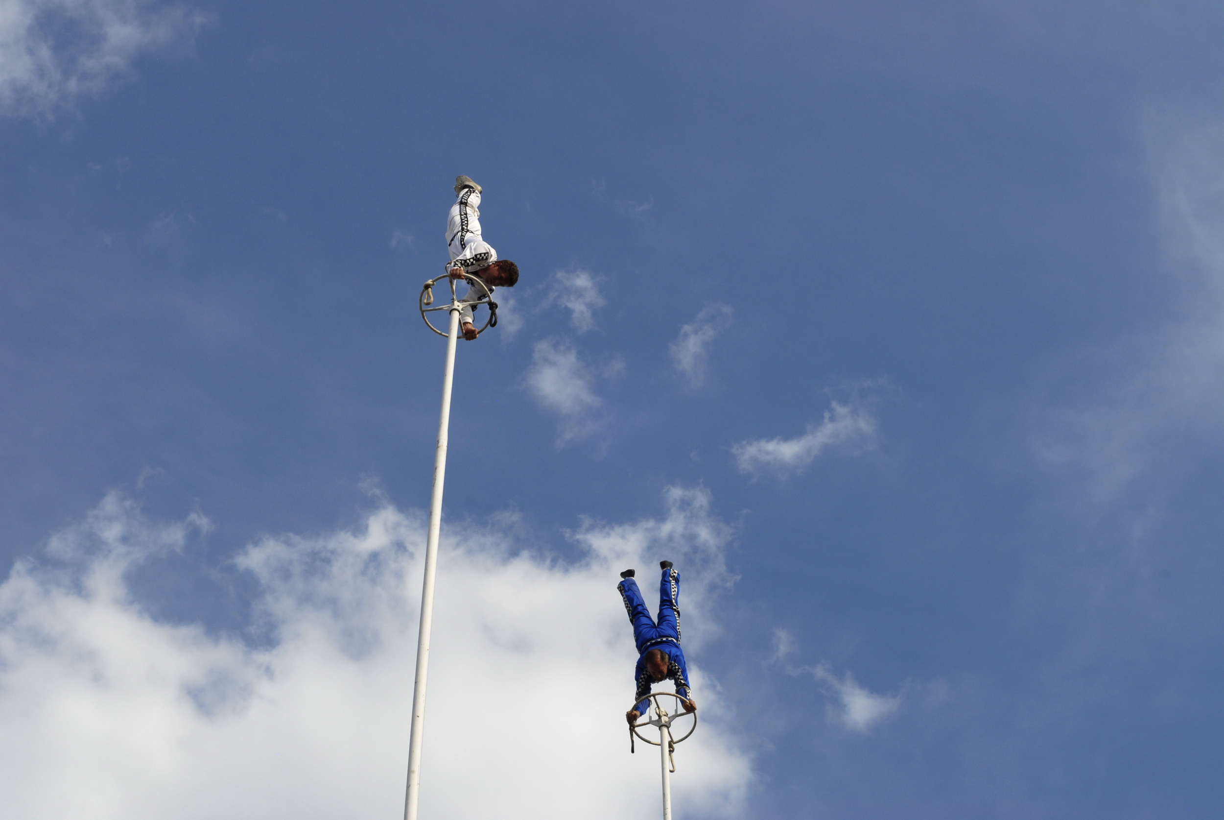 Members of the Nerveless Nocks perform handstands far above the audience at the Kentucky State Fair. 