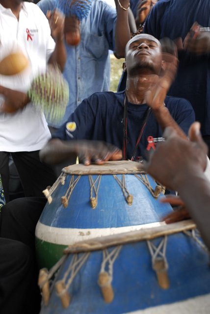 A drummer entertains participants of a health presentation in Lomé, Togo. 