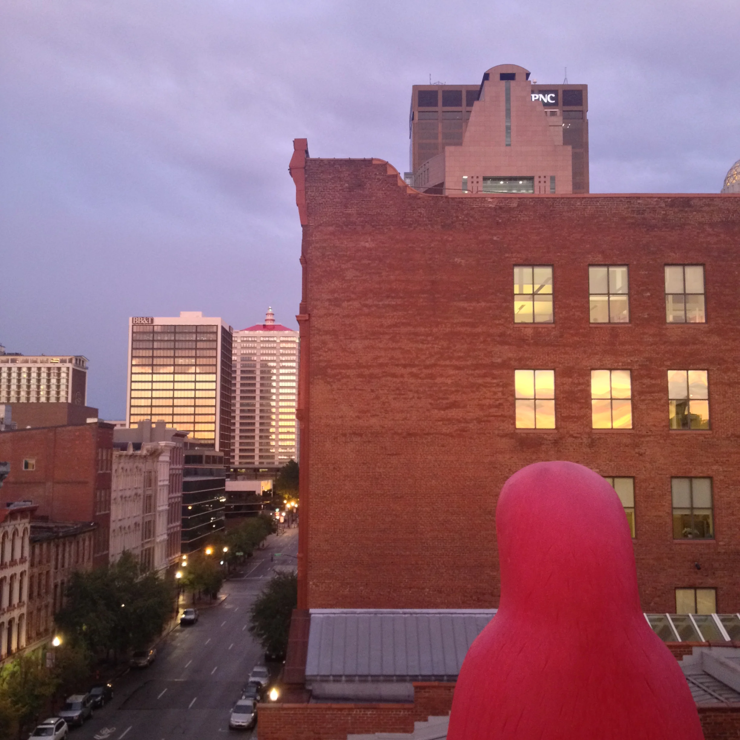 Red penguin watches over Louisville from the fancy rooftop apartment