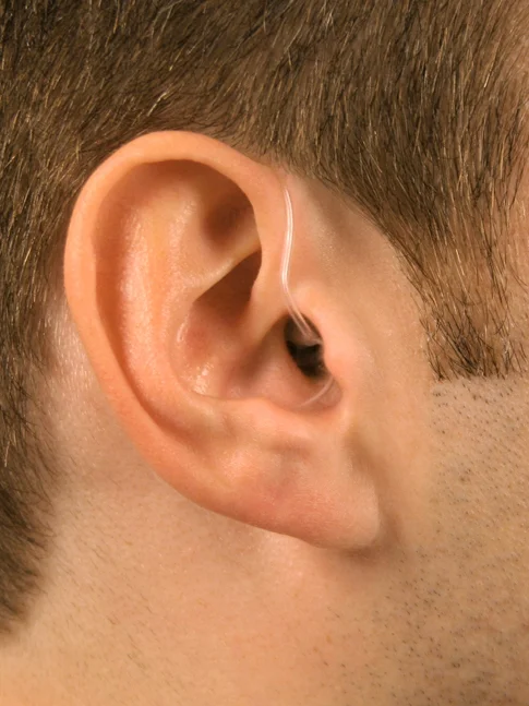 open fit BTE hearing aid in a patients ear