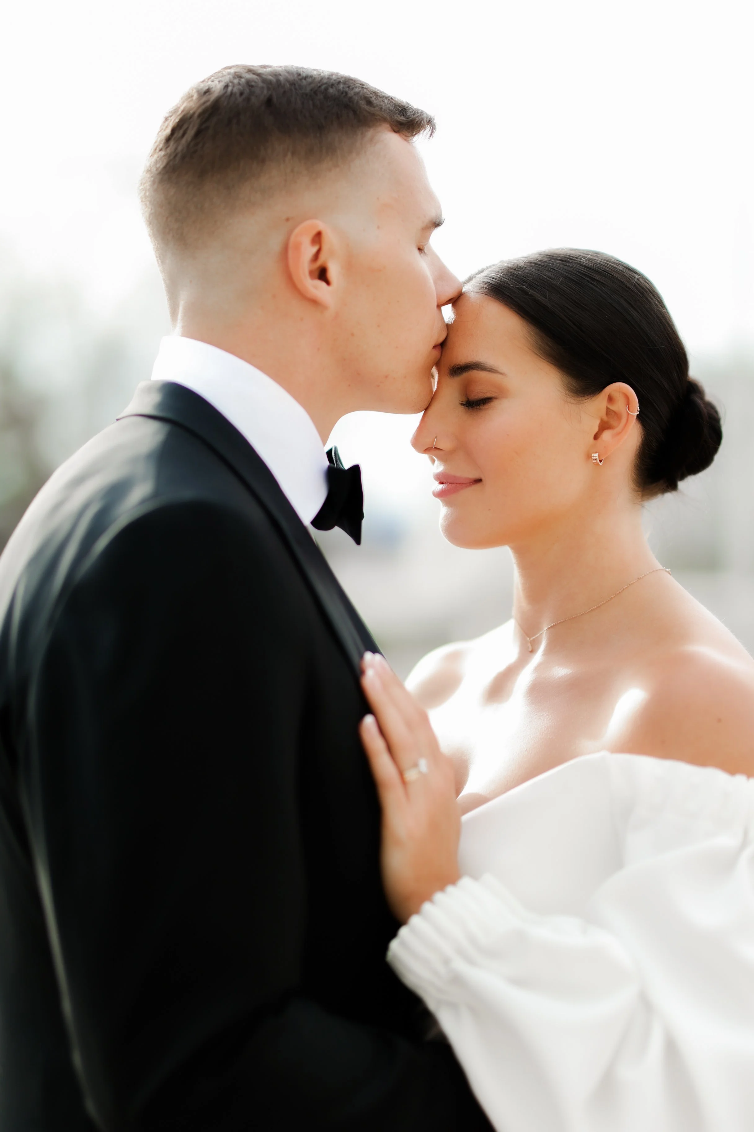 Bride and groom sharing an intimate hug