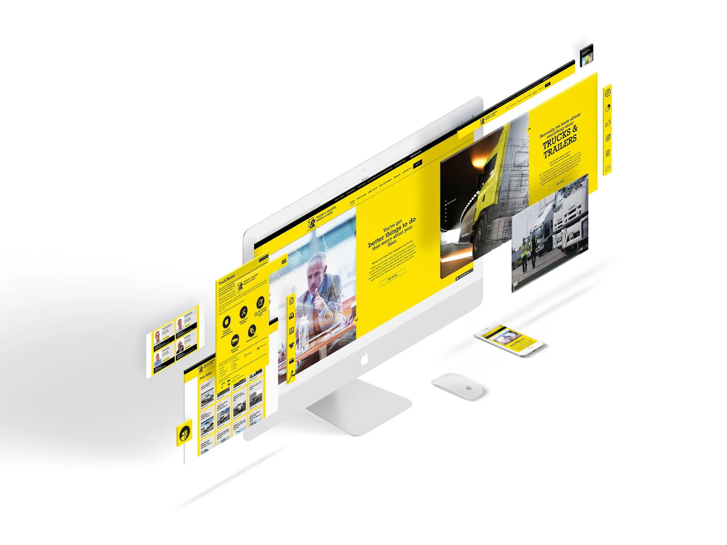A computer monitor, keyboard, and mouse displaying a website for trucks and trailers, with various pages featuring yellow and black themes, customer photos, and vehicle gallery.