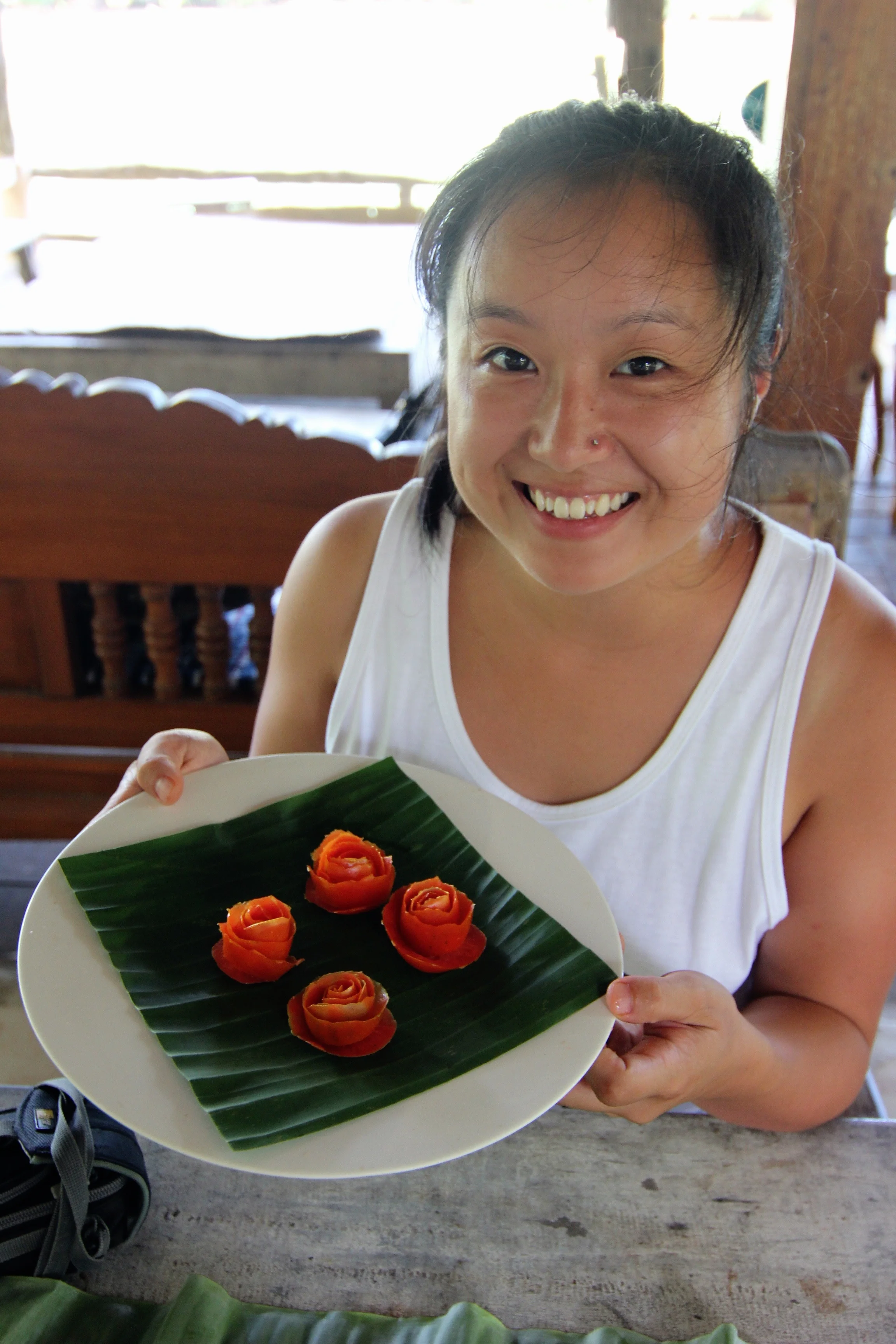 Learned how to make roses out of tomato peels.