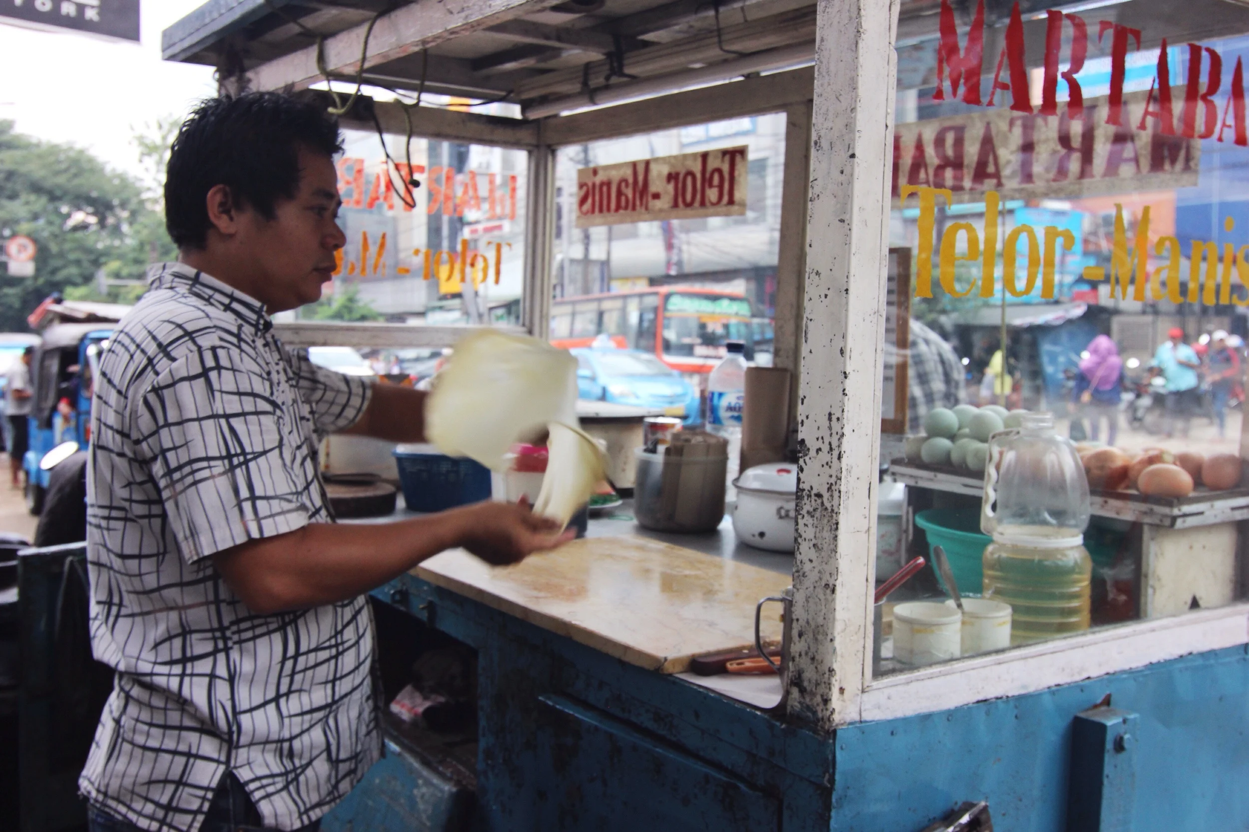 Martabak - an omelette fried in a thin pancake.