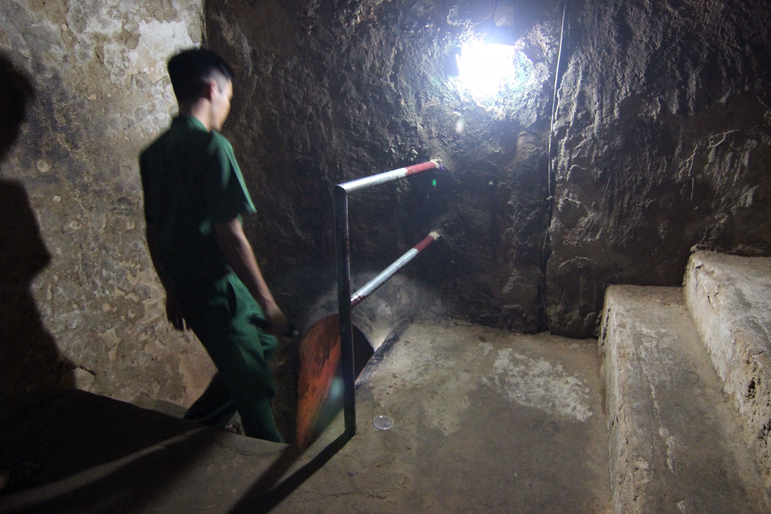 An employee leads us into a section of the original tunnel network.