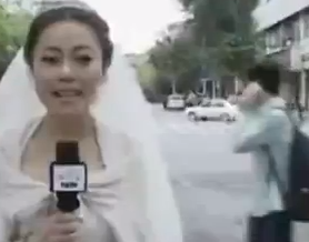 Anchor Reported From Earthquake in Her Wedding Dress