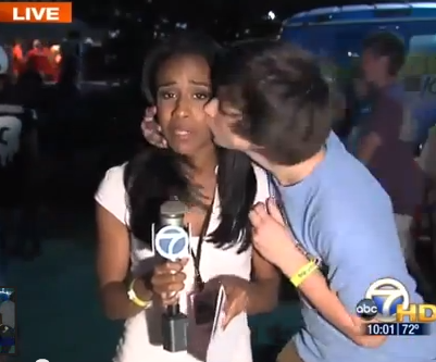 Reporter Gets Kissed Live...Kisser Says Sorry