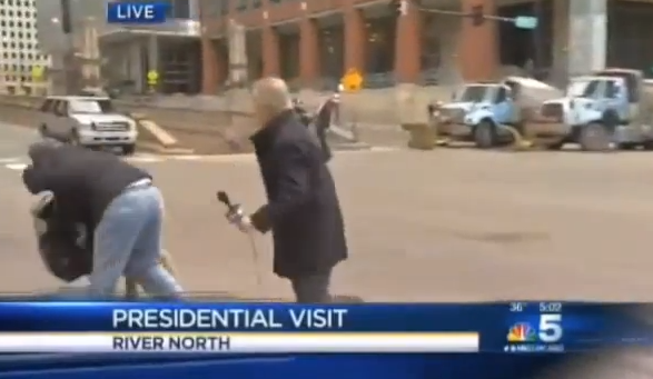 Protestor Interrupts Chicago Station's live shot