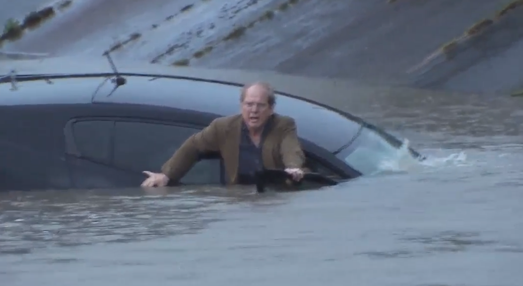Houston Reporter Helps Rescue Man in Flood Waters